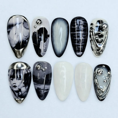 Noir Surrealism Chrome Nails